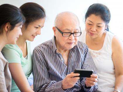 Senior Asian Man with Family